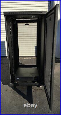 TripLite 24U SmartRack Mid-Depth Rack Enclosure Cabinet with APC UPS Battery Pack